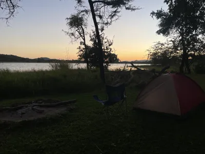 Sunset over the dam at Shambololo